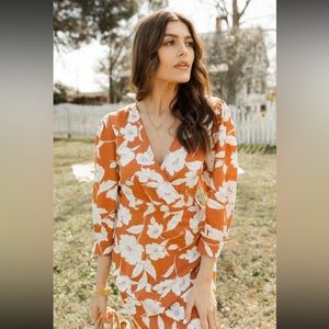 Orange Floral Surplice Wrap Dress with Bubble Sleeves. Size: M. Only Worn Once!